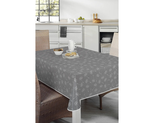 Grå bordsduk med maskrosmönster på ett matbord