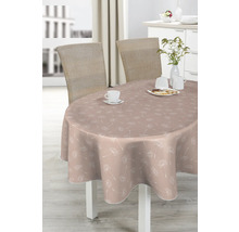 Ovalbord med duk med maskrosmönster, serverat med porslin och bakverk.