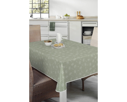 Bord med vaxduk i köksinredning med maskrosmönster