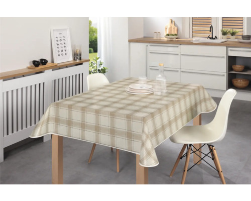 Matbord med rutig duk i köket