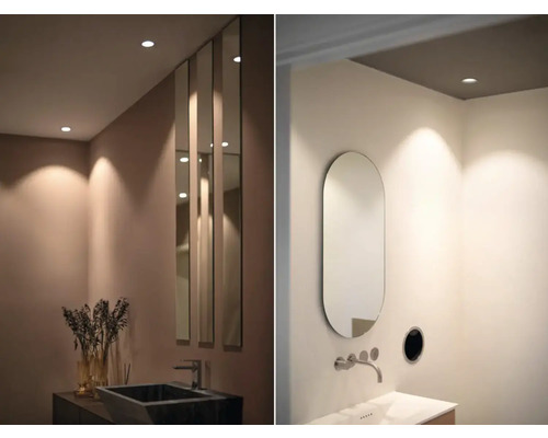 Badrum med infällda takspotlights, handfat och speglar