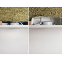 Infälld spotlight med isoleringsull i ett vitt skåp