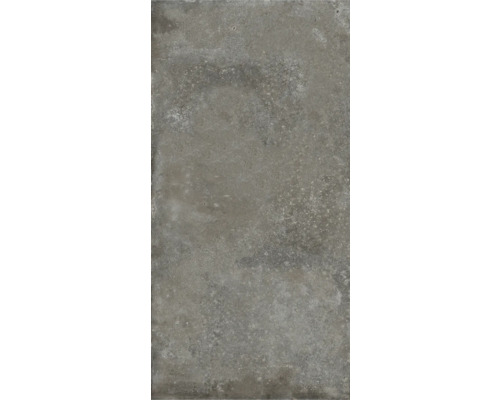 Grått golvplatta med betongutseende.