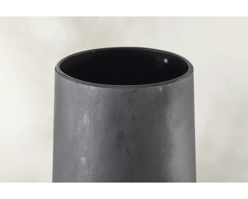 Detaljvy av en cylindrisk växtlåda