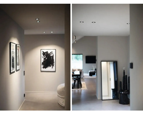 Hall med infällda spotlights, inramade bilder och spegel