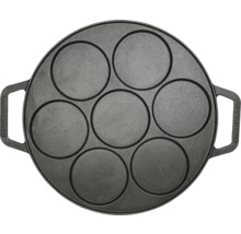 Stekpanna i gjutjärn med sju runda fördjupningar