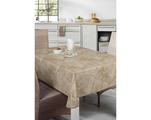 Bord med marmorlook vaxduk i ett kök