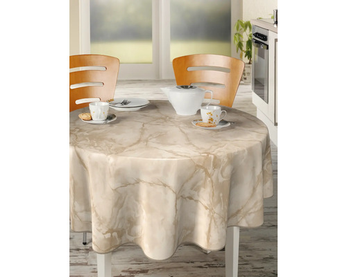 Rund bord med marmor-duk, bordsservis och stolar