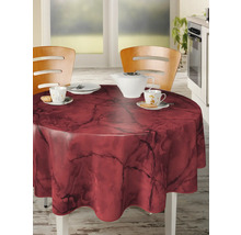 Runt bord med mörk röd marmorduk i ett kök