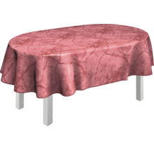 Ovalt bord med en mönstrad bordsduk