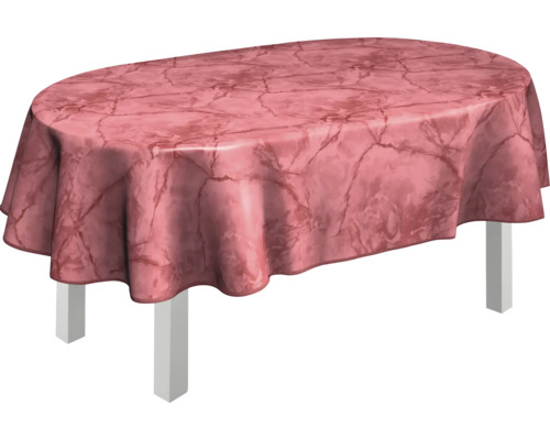 Ovalt bord med en mönstrad bordsduk