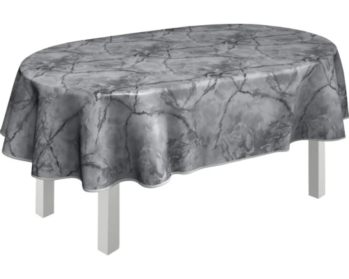 Ovalt bord med grå bordsduk i marmordesign