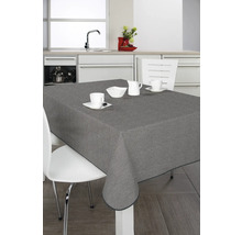 Grå bordsduk på ett bord i ett ljust kök