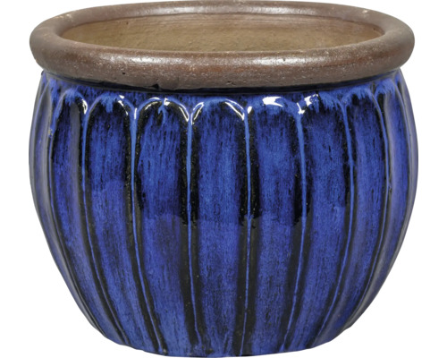 Blå keramisk blomkruka med räfflad yta