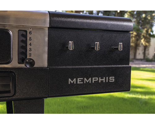 Detaljvy av en Memphis grill med temperaturregulator och kontrollknappar