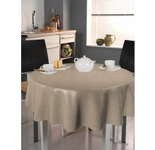 Runt bord med beige duk i ett kök