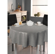 Grå duk på ett runt bord i ett kök