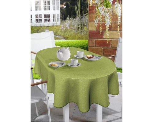 Dukat trädgårdsbord med ljusgrön, oval duk, porslin och kaka