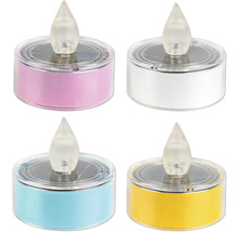 Fyra solcellsdrivna LED-ljus i olika färger