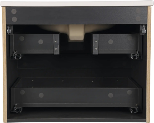 Invändig vy av ett tvättställsskåp med lådor