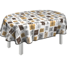 Oval bord med duk med kaffemotiv på ett bord