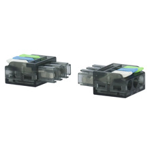 Två transparenta kopplingsklämmor för elinstallation