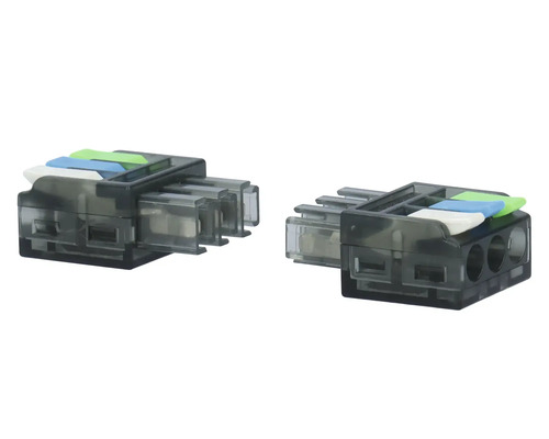 Två transparenta kopplingsklämmor för elinstallation