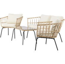 Trädgårdsmöbelset med rottingfåtöljer och glasbord