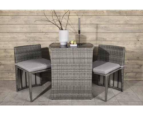 Trädgårdsset med bord och två stolar i rotting