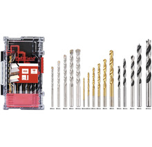 Pattfield borrset med olika typer och storlekar av borrar i en transparent förvaringslåda