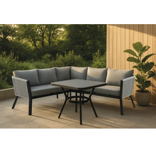 Trädgårdsmöbelset med hörnsoffa och fyrkantigt bord på en terrass.