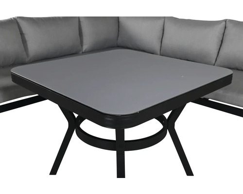 Trädgårdsbord med metallram och hörnsoffa med dynor