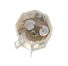 Interiörbild av ett trädgårdshus med sittgrupp och hyllor