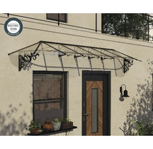 Genomskinligt entrétak med svarta dekorerade metallkonsoler monterat över en ytterdörr och ett fönster, registrerad design.