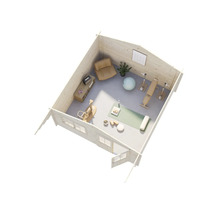 Interiör av ett trädgårdshus inrett som gym med diverse träningsutrustning och en sittgrupp