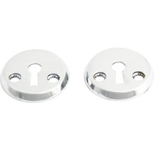 Två nyckelhålsbeslag av metall