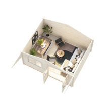 Interiörbild av ett trädgårdshus med matbord, soffa och fåtöljer