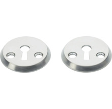 Två dörrhandtagsrosetter för cylinderlås