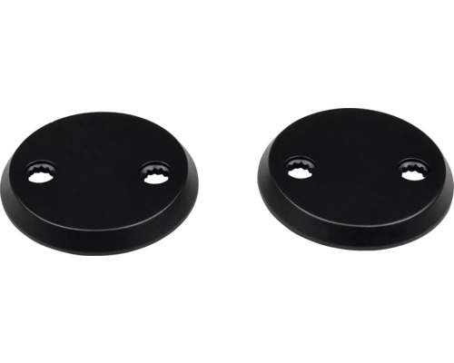 Två runda, svarta rosetter för vattenkranar