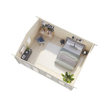 Interiör av ett trädgårdshus med sovrum och arbetsplats