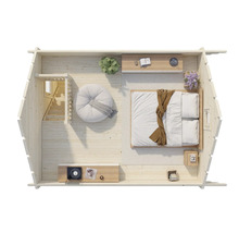 Interiörbild av ett trähus med sovrum, sittgrupp och trappa