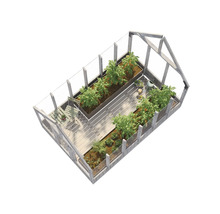 Växthus med växter och odlingsbord