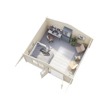 Interiör av ett trädgårdshus i trä med sovdel, arbetsplats och sittgrupp.