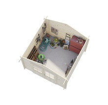 Interiörbild av ett trädgårdshus med trädgårdsredskap, grill och verktyg