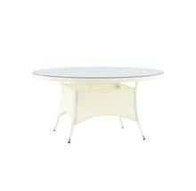 Runt trädgårdsbord med glasskiva och rottingutseende