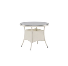 Runt trädgårdsbord med glasskiva och rottingstruktur