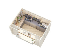 Interiör av en trädgårdstuga i trä med restaurangutrustning