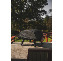 Täckt gasolgrill på en terrass