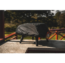 Övertäckt gasolgrill på en terrass