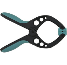 Fjäderklämma av plast